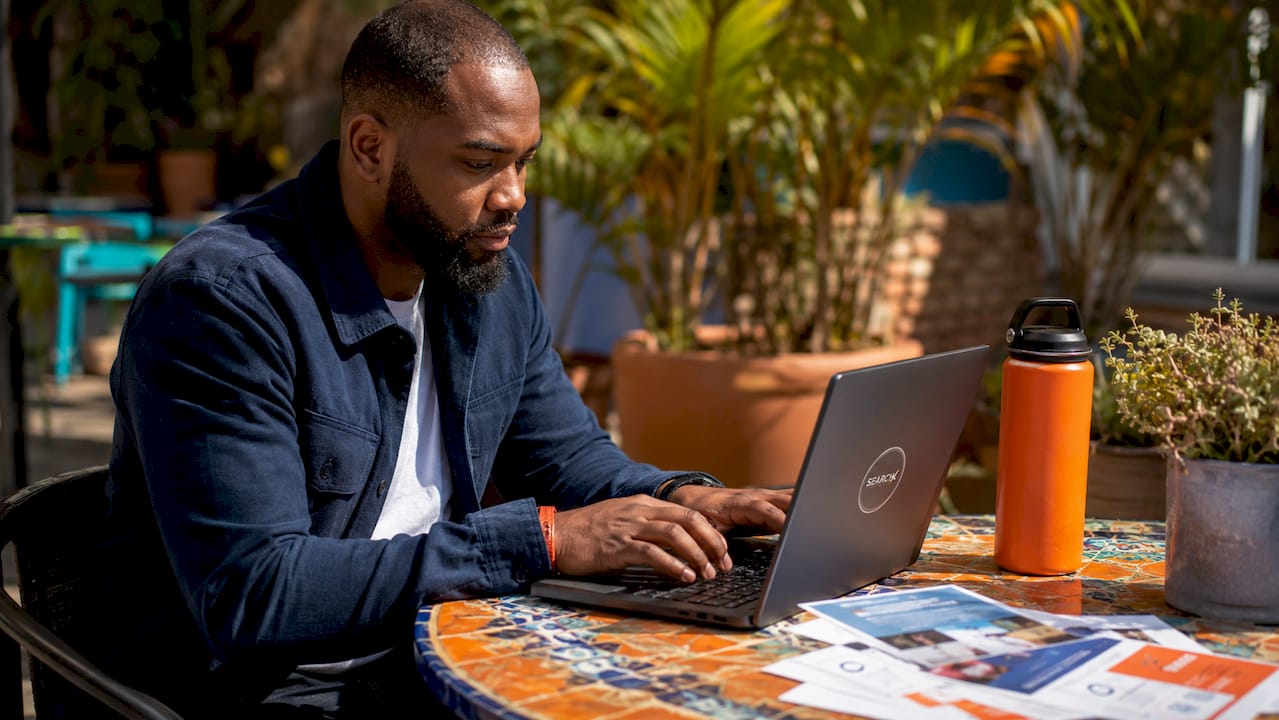 Man editing business profile at neighborhood office